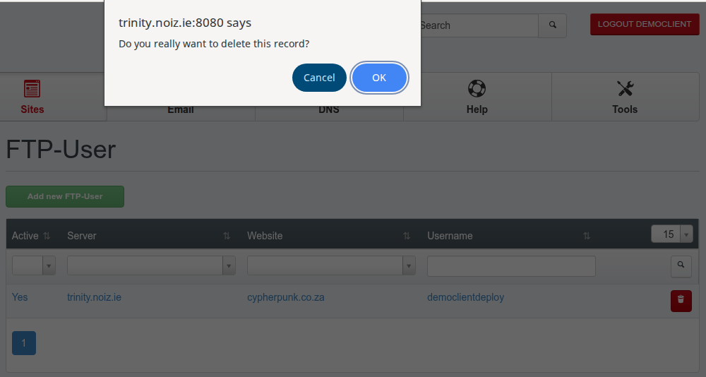 The browser confirmation dialogue ISPConfig opens over the FTP-User list, asking Do you really want to delete this record? with Cancel and OK buttons