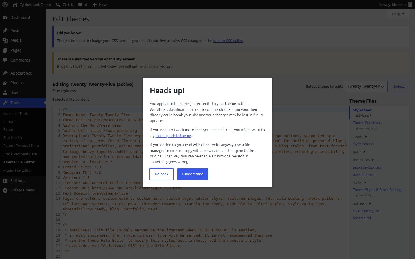 The WordPress Theme File Editor screen showing the code text box, the list of theme files on the right, and the warning banner about editing theme files directly